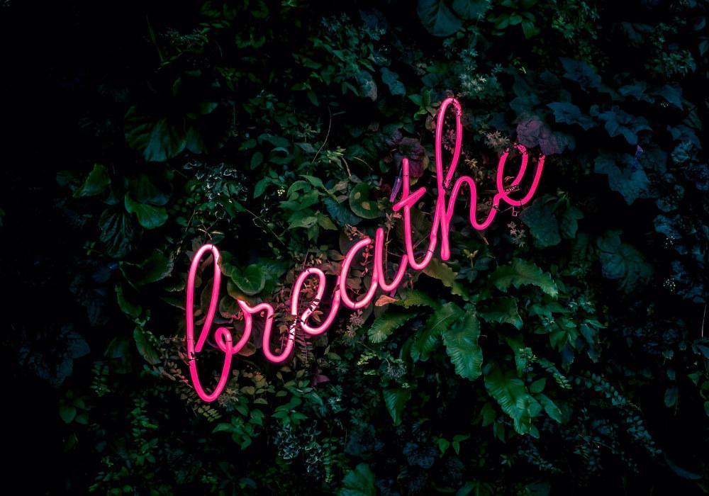 Neonskylt breathe